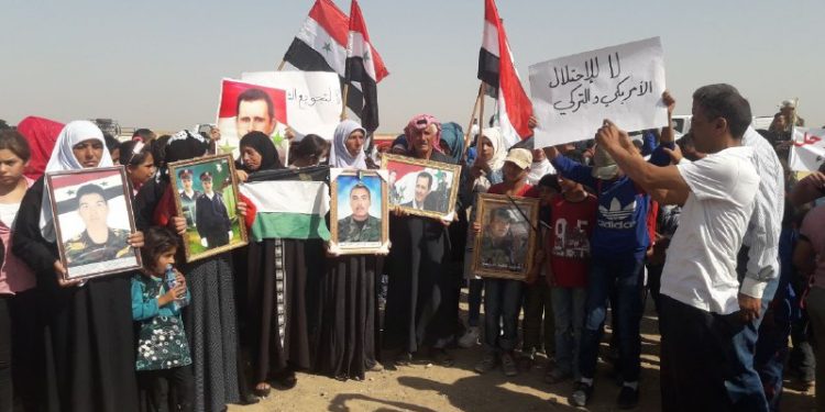 وقفة احتجاجية في الحسكة ضد القوات الأمريكية والتركية