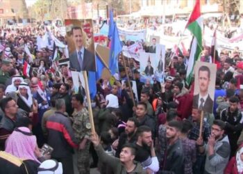 السوريون يطالبون الرئيس الأسد بالترشح للرئاسة