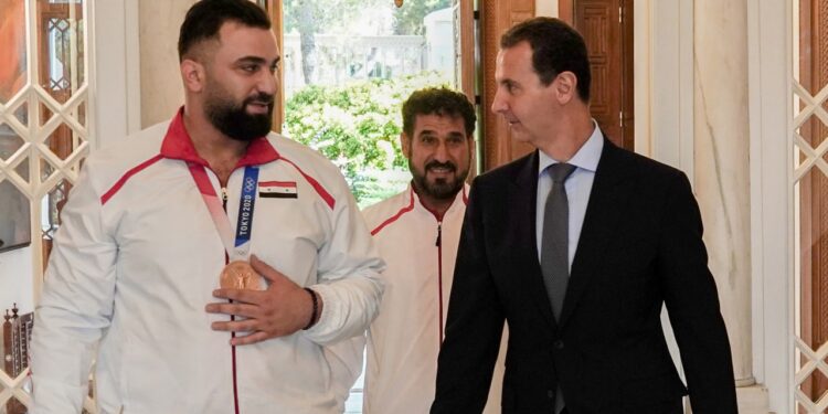 الرئيس الأسد يستقبل البطل الربّاع معن أسعد